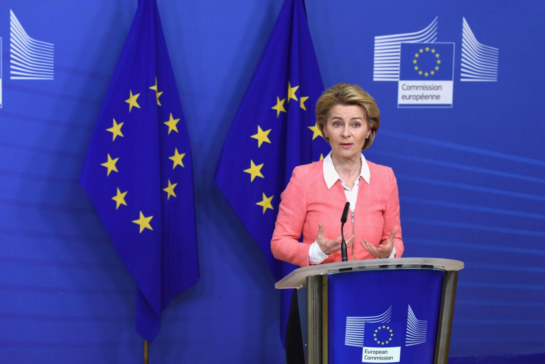 Woman talking into a lectern