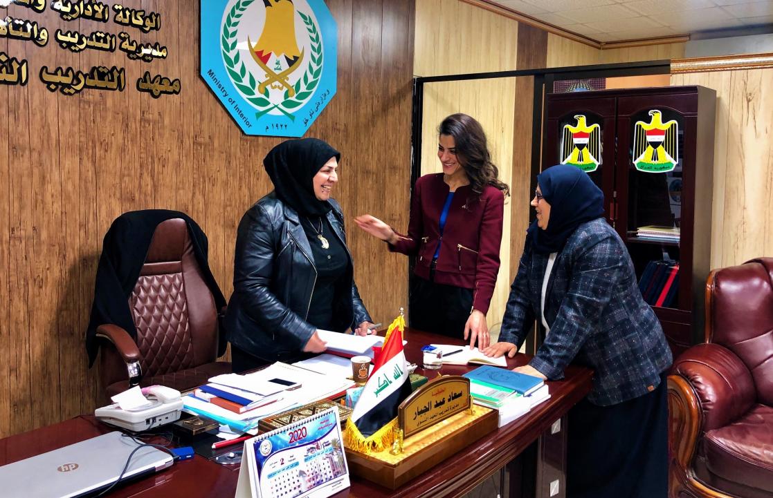 Three women talking in a room
