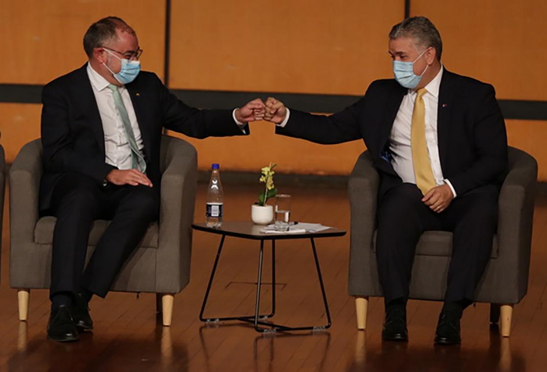 Two men greeting each other