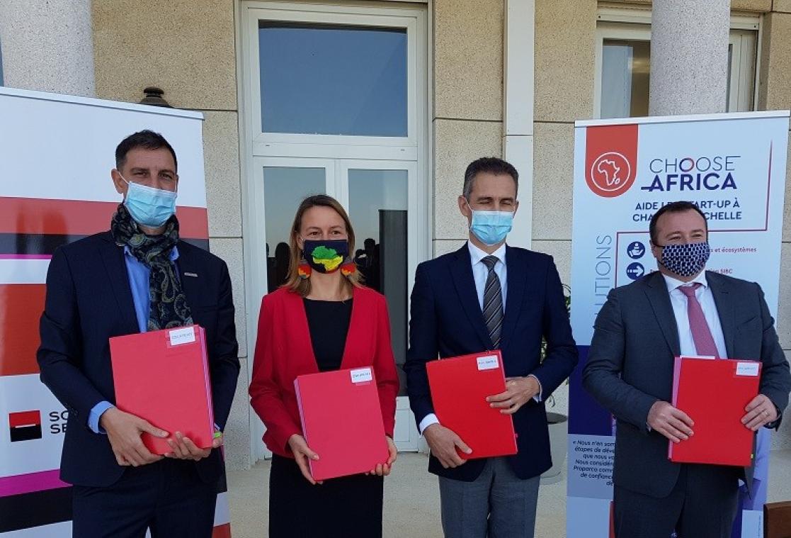 Group of people holding documents
