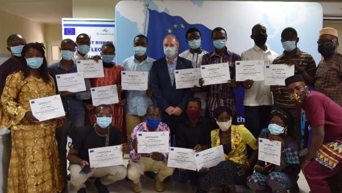 Group of people with diplomas