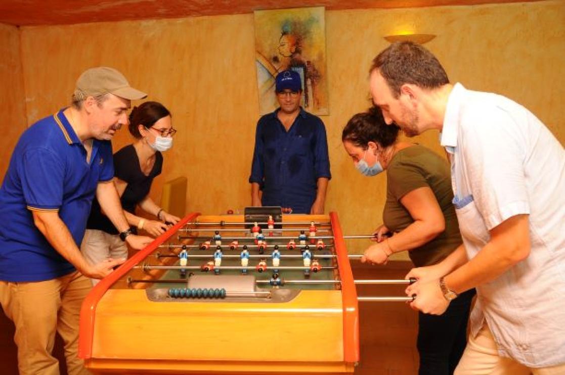 People playing Foosball