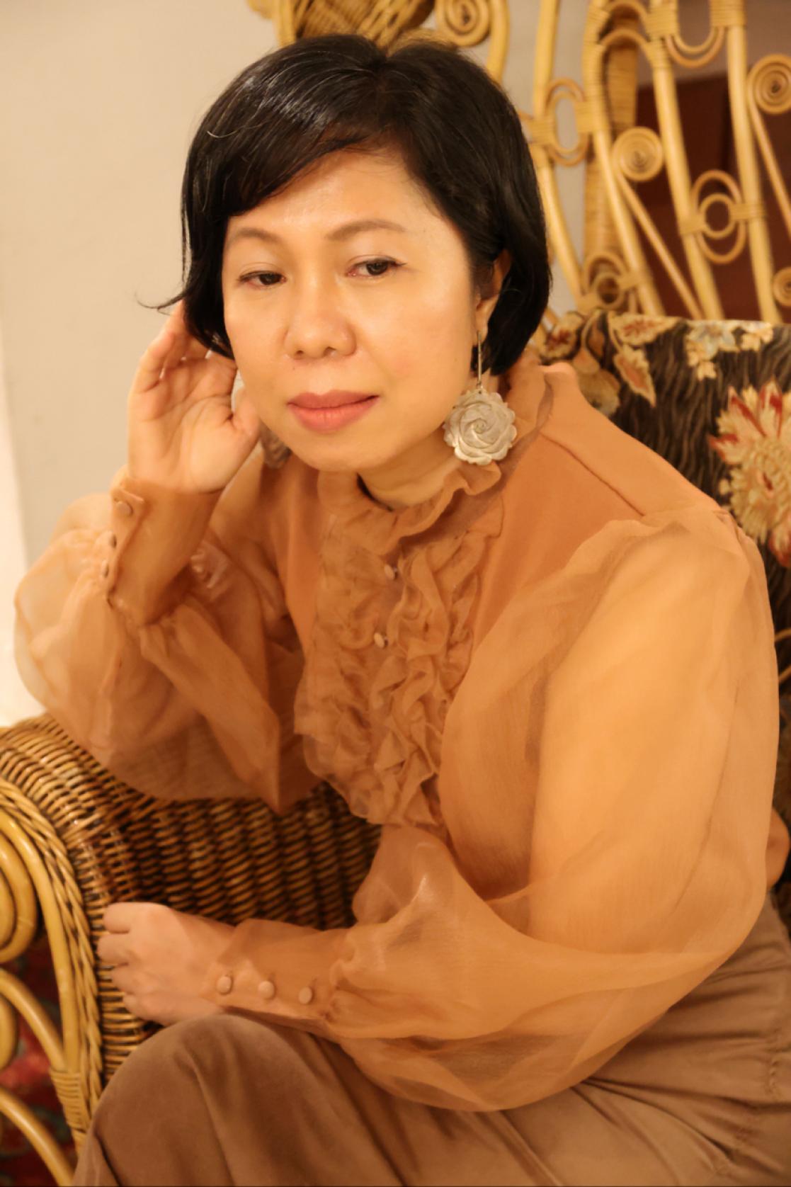 Woman wearing brown clothes