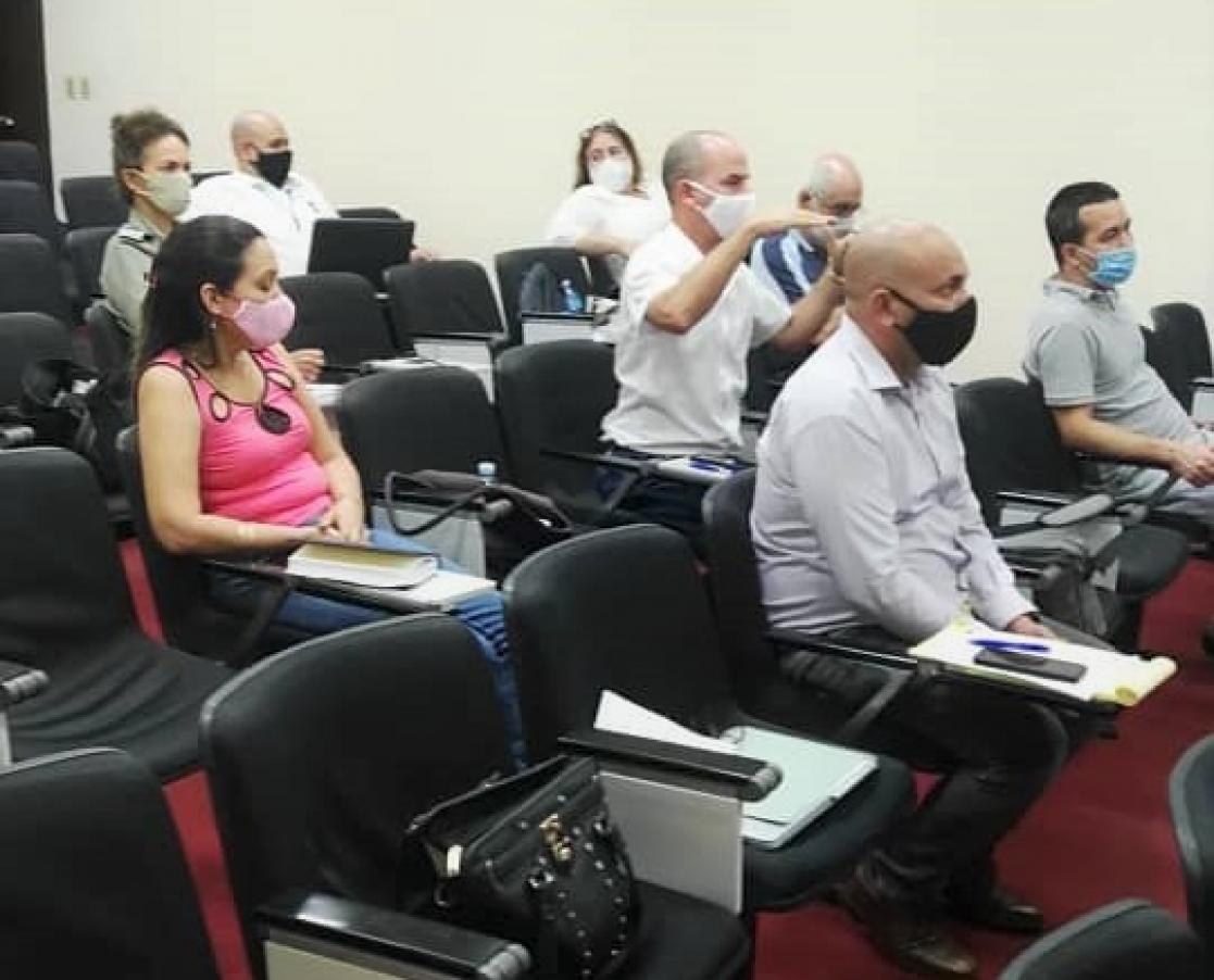 Group of people attending a meeting