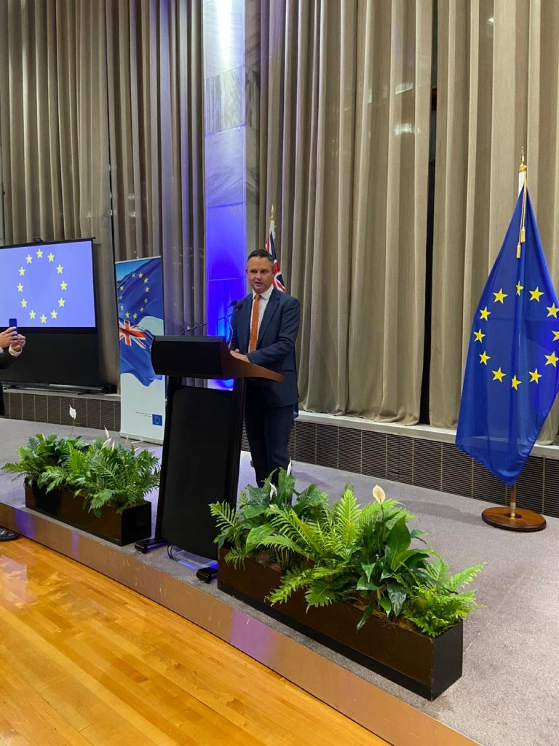 Man giving a speech on a lectern