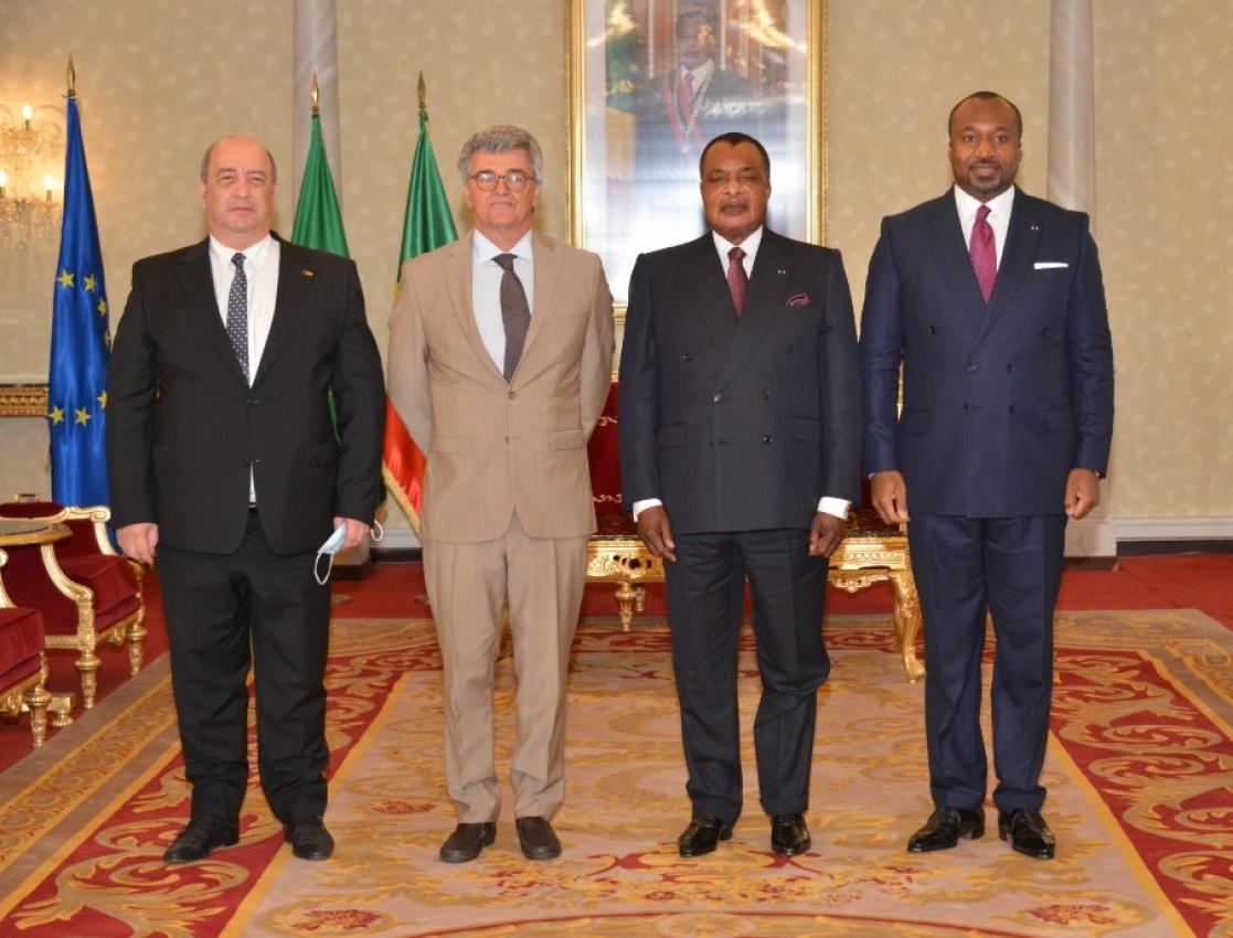 Group of people posing in front of the camera