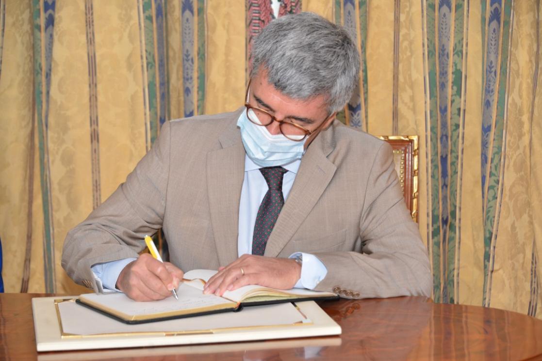 Man signing a document