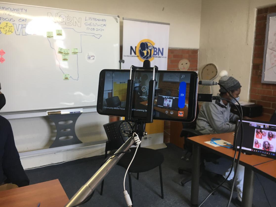 People filming with a mobile phone 