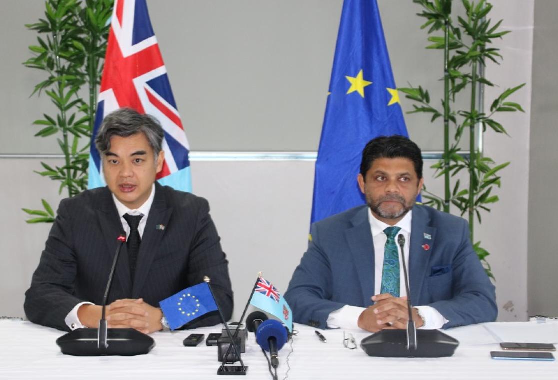 Two men during a conference