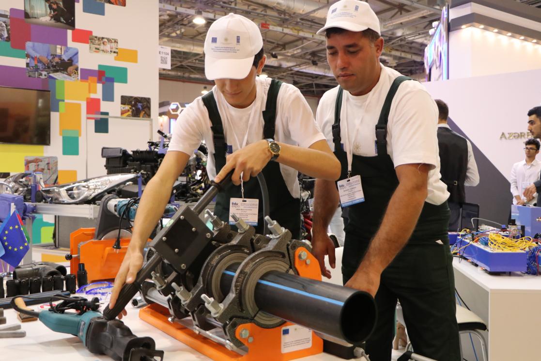 Men working with a machine