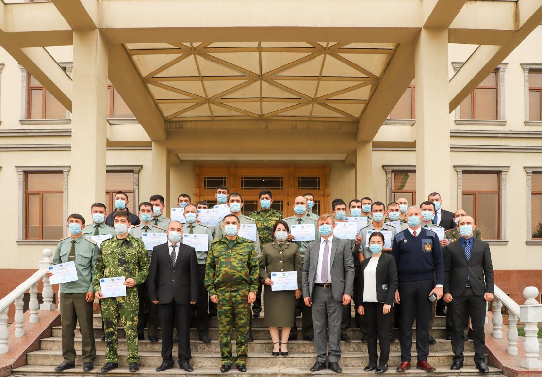Group of people with diplomas