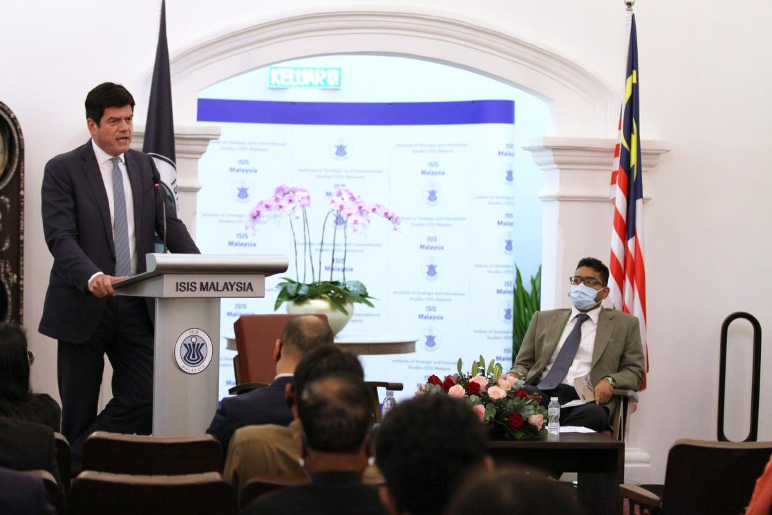Public and speakers during a presentation