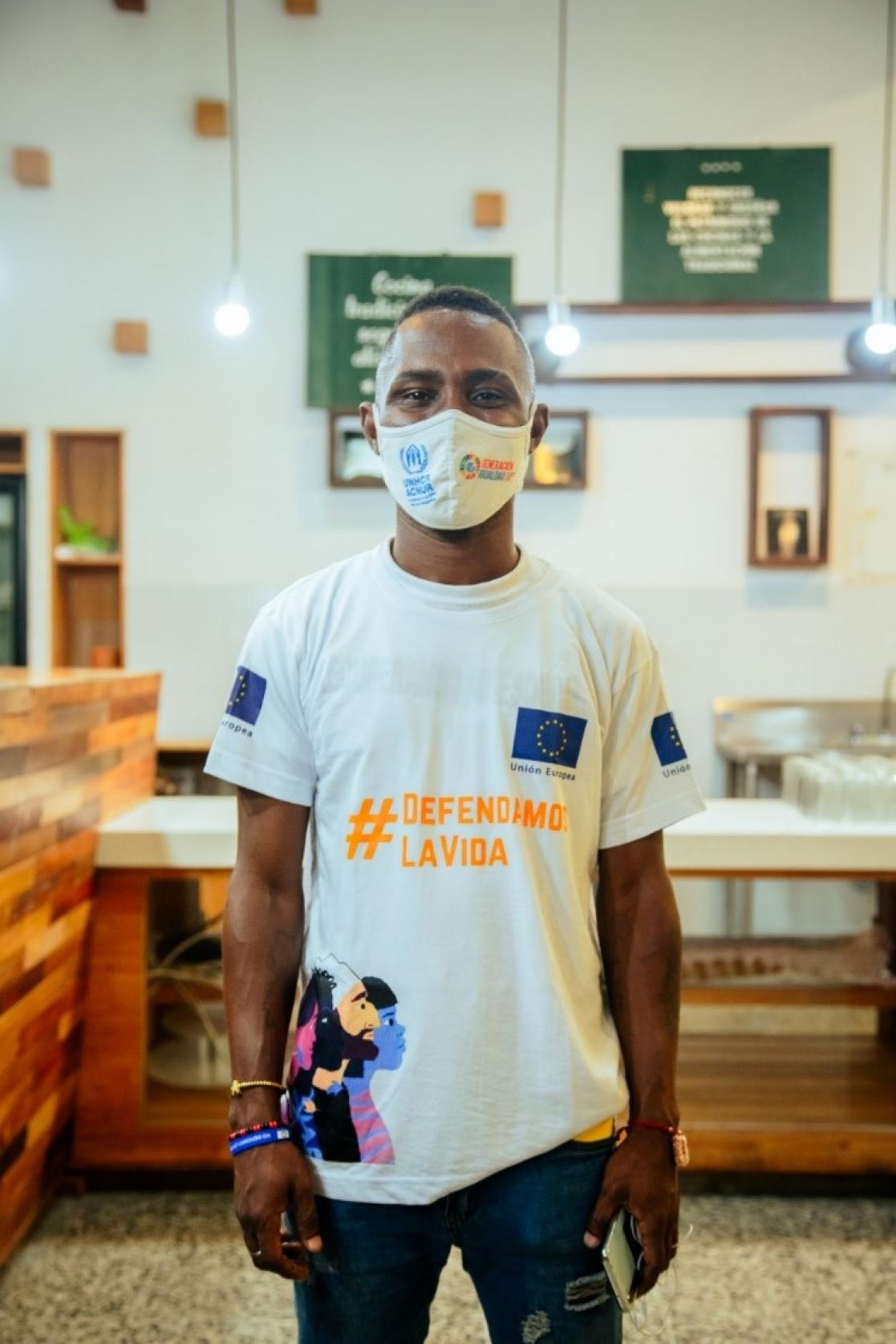 Man wearing a face mask and a t-shirt about human rights