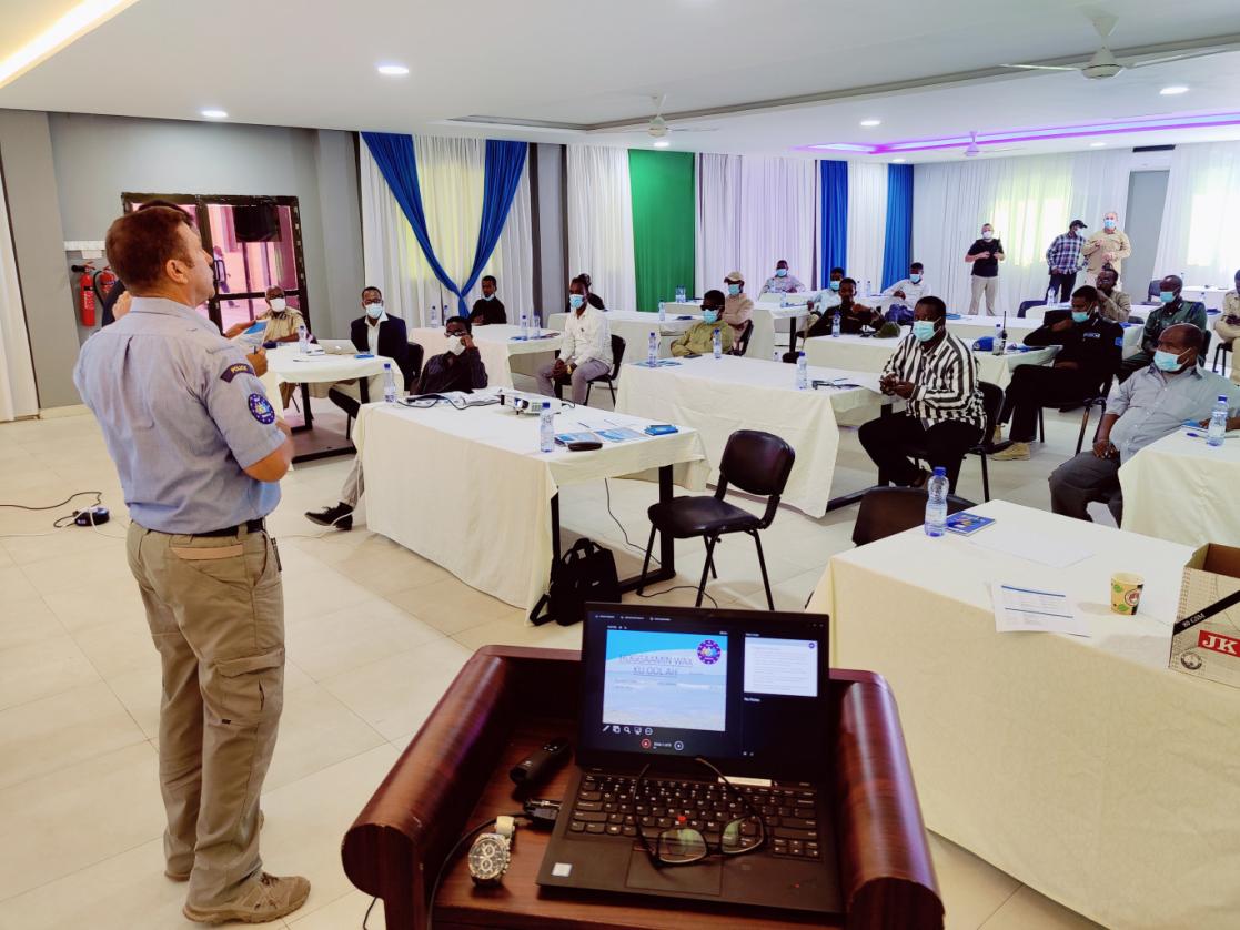 a man giving a conference 