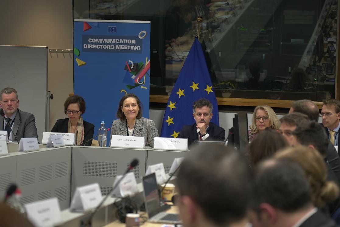 Picture of Director Aude and EU Comm directors looking at participant speaking