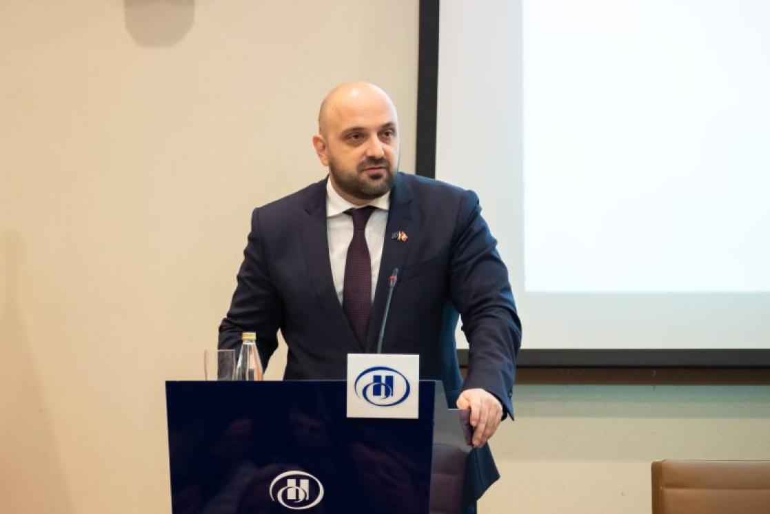 Bojan Božović, State Secretary at the Ministry of European Affairs of Montenegro standing and speaking