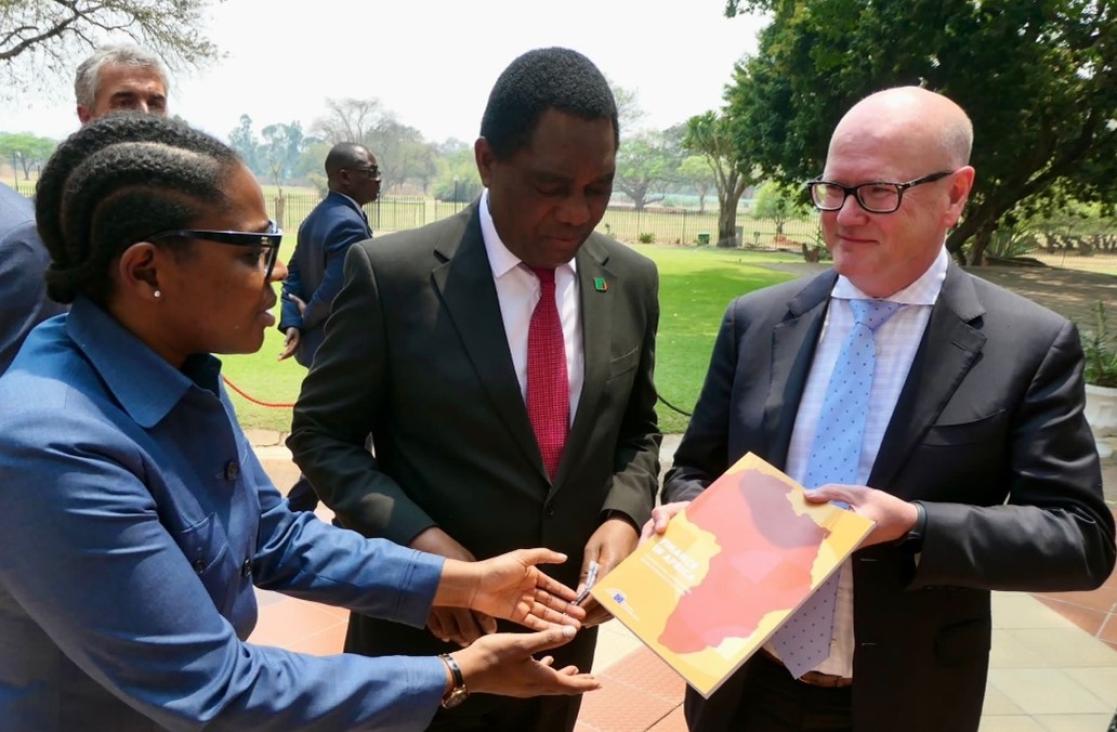 President Hichilema receiving first copy of EIB Finance in Africa report