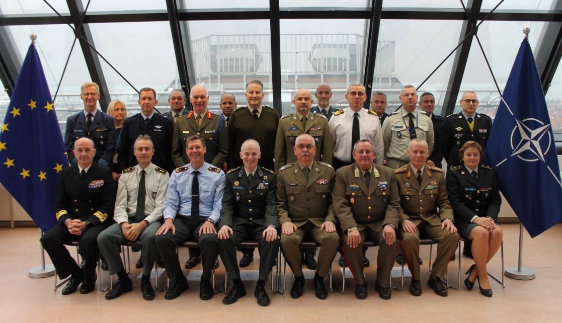 Family photo of NATO and EUMS conference participants.