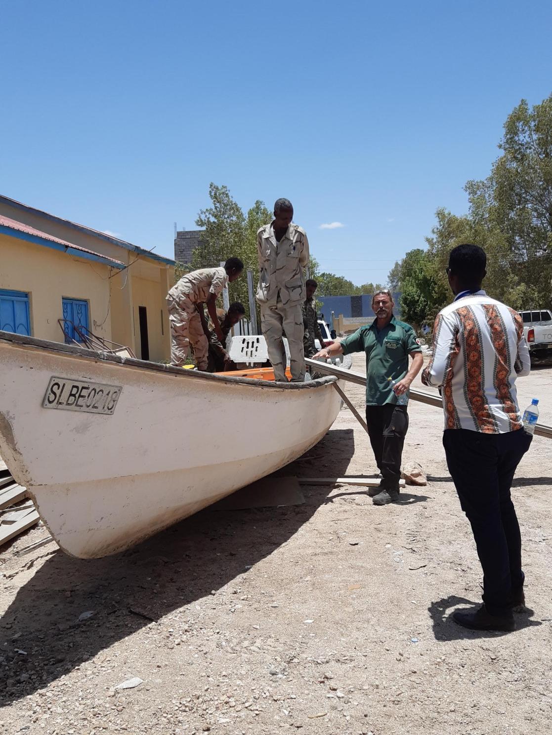 men with a boat 