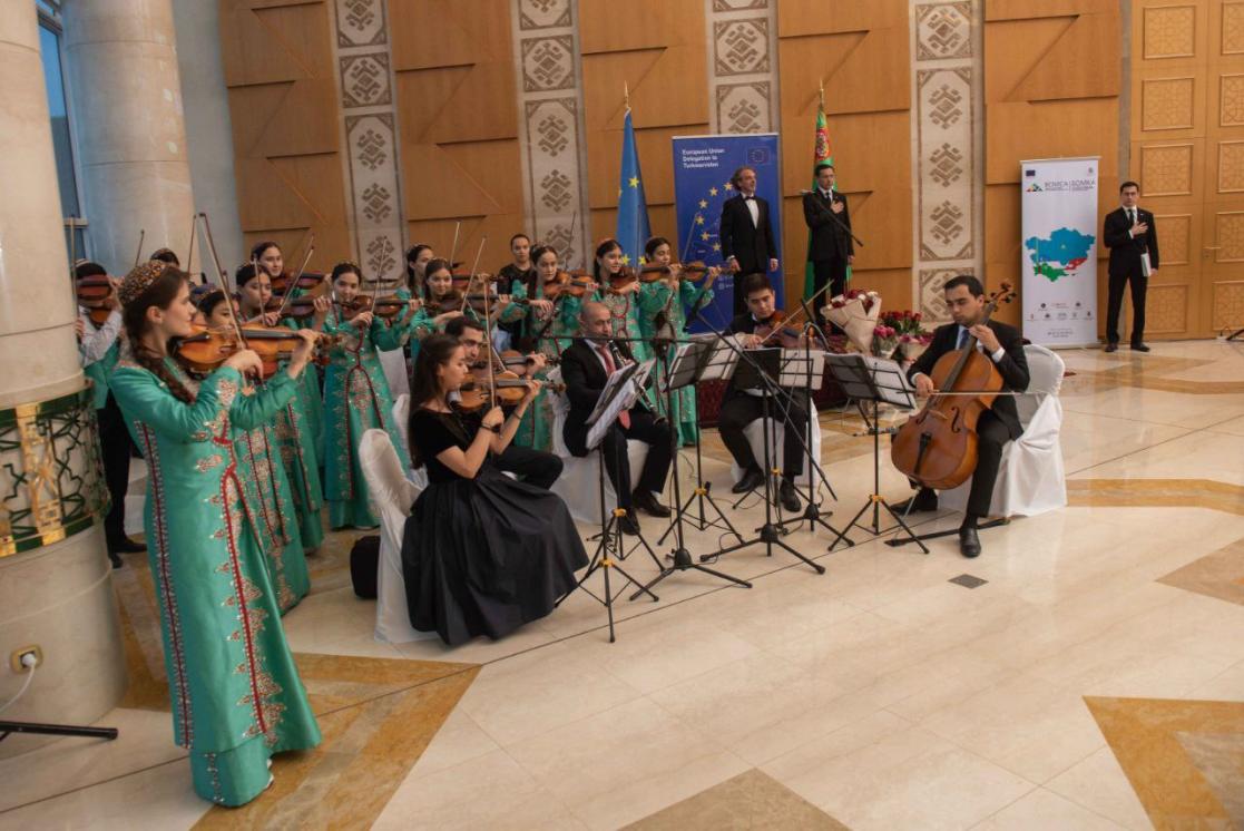 Classic music orchestras playing national anthem of Turkmenistan and the European Union