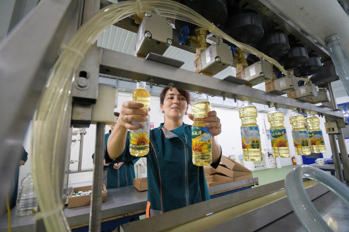 Person working in an oil factory