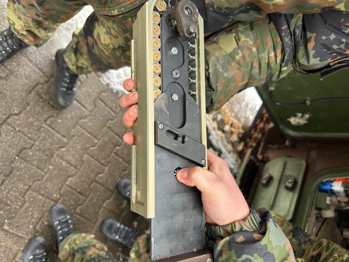 Soldiers training with ammuntion. 