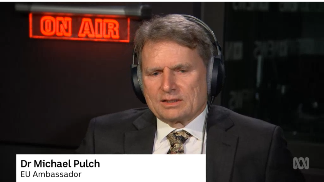 Man with headphones in a radio programme