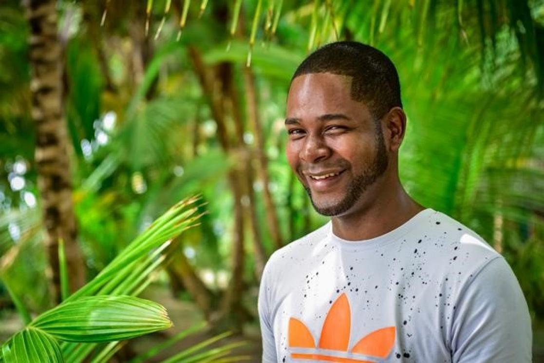Man smiling in the forest