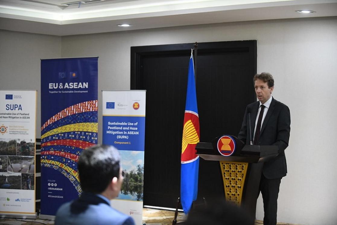 Person speaking at a conference