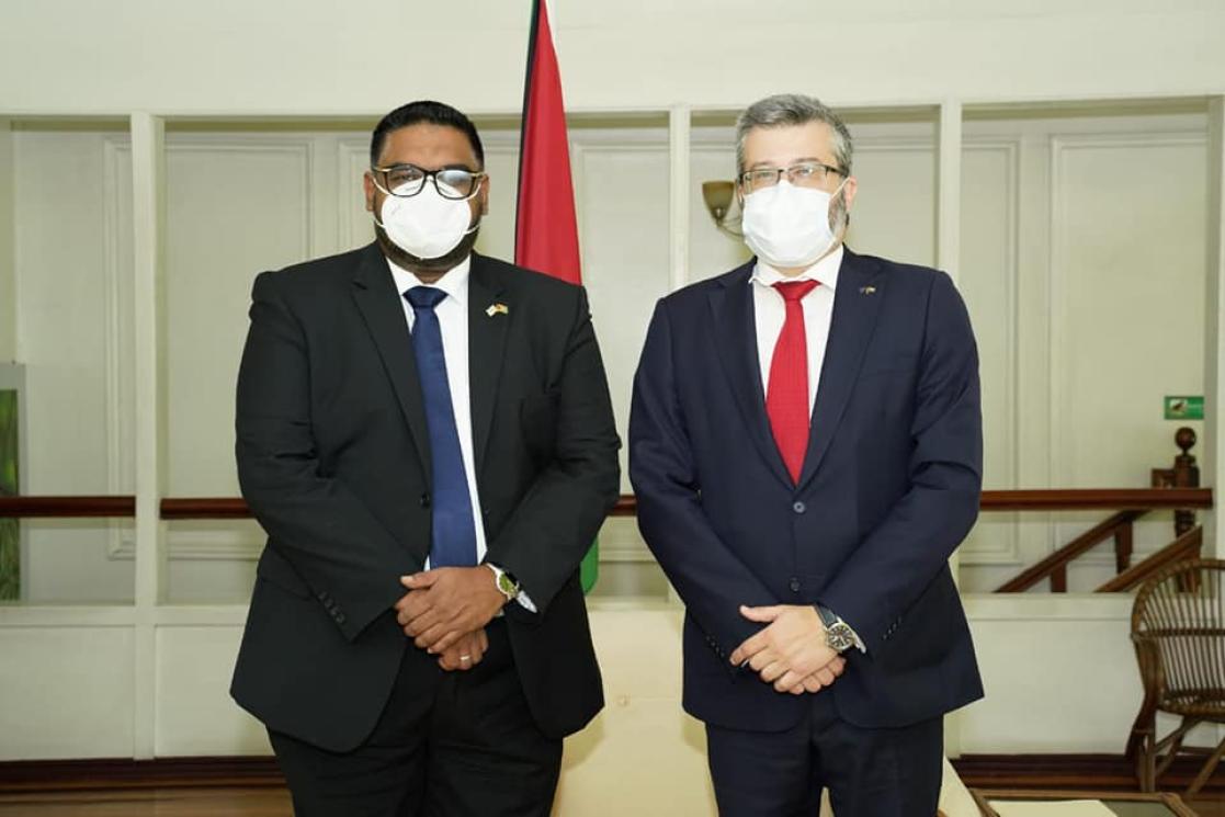 Two people in front of the camera