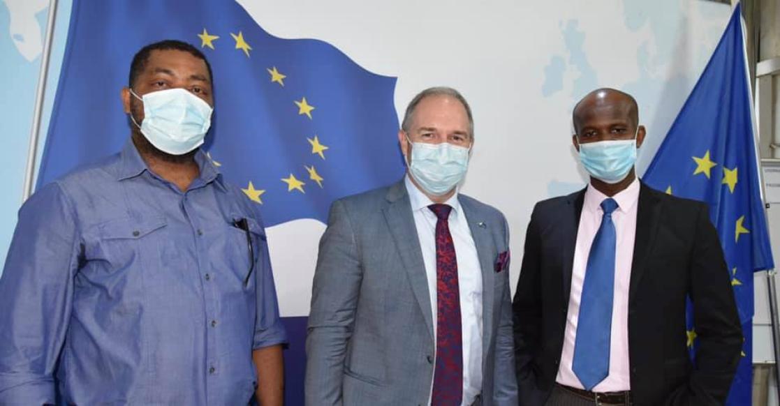 Three people with masks