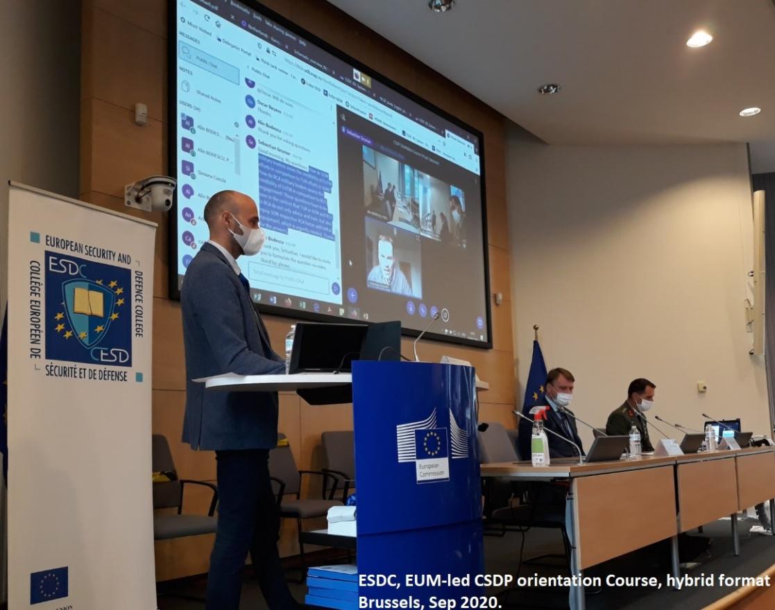 Man talking into a lectern
