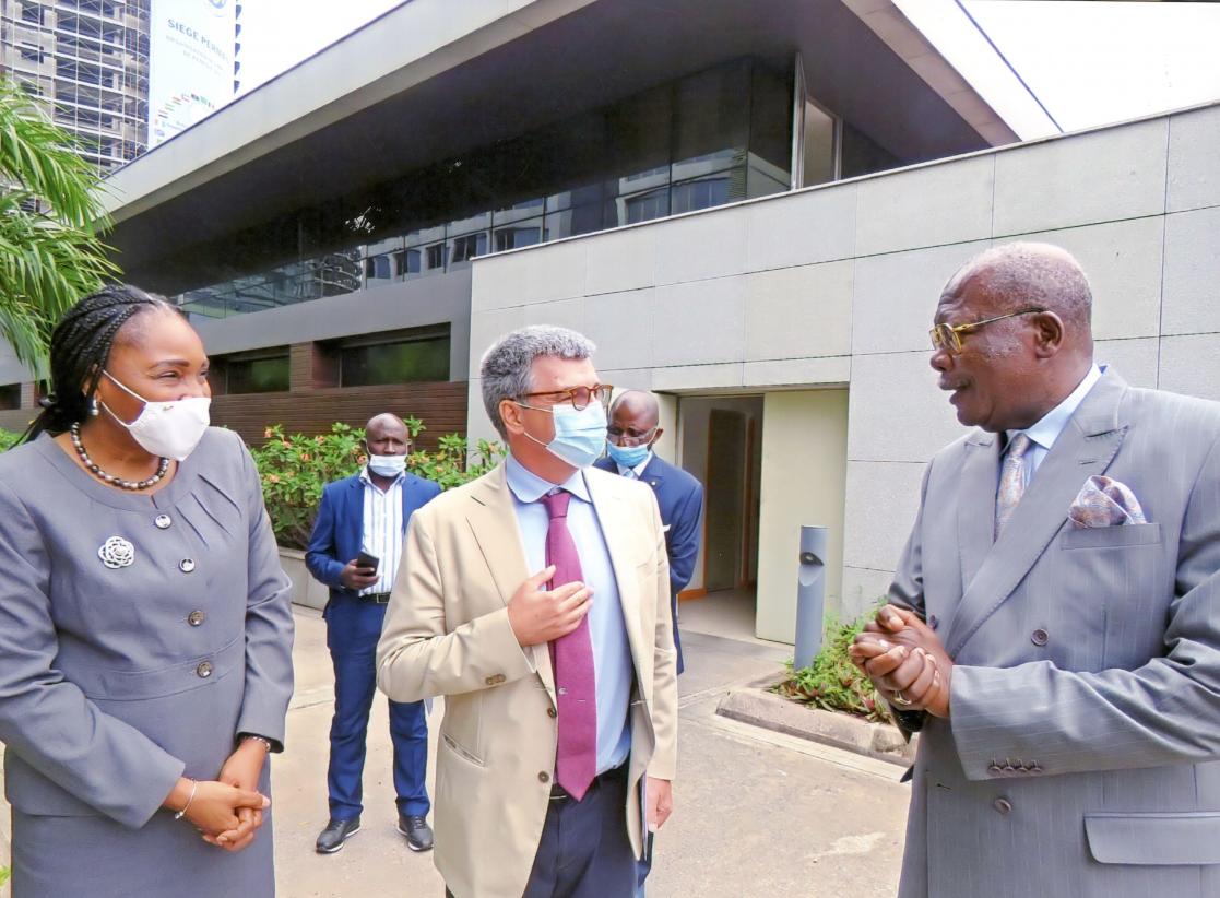 Three people talking to each other