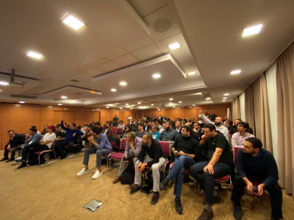 Group of people listening in a meeting