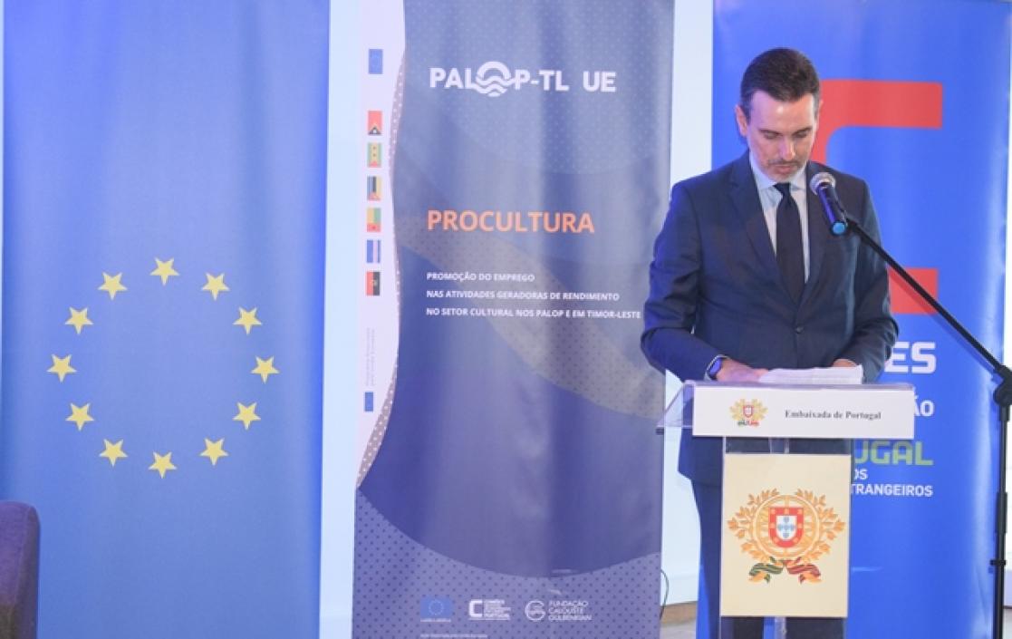 Man talking into a lectern