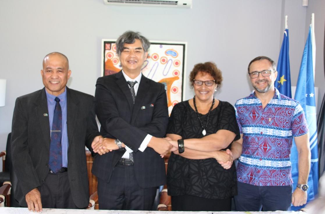 Group of people holding hands