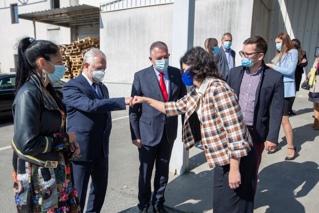 Group of people greeting to each other