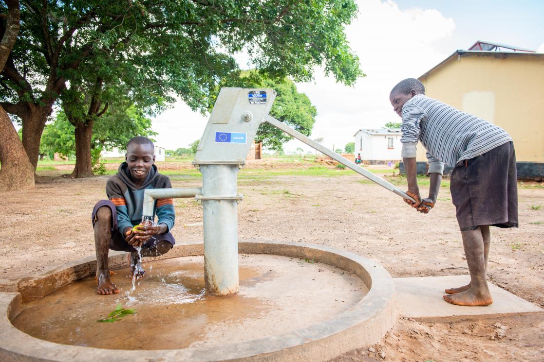 Zambia boys with a filter water design