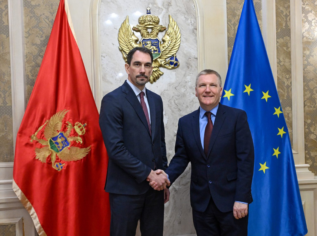 Commissioner Michael McGrath shaking hands with Supreme State Prosecutor Milorad Marković