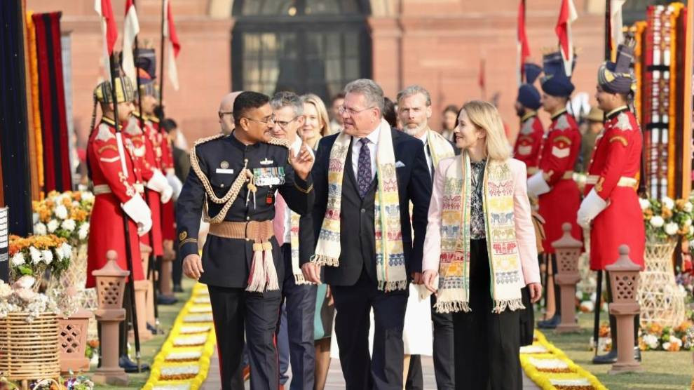 Three dignitaries walking in New Delhi