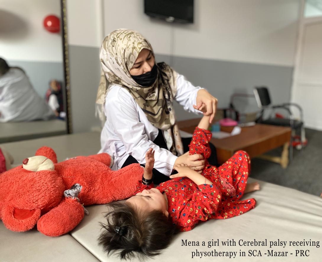 Mena, a two year old patient received rehabilitation treatment after an injury, funded by the European Union.  