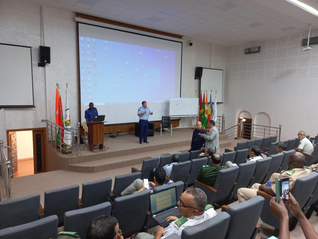 Audience and speakers at a conference