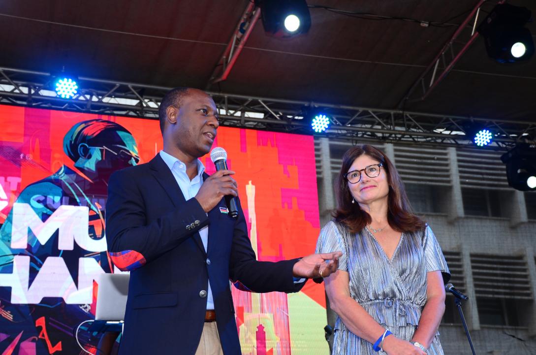 EU Ambassador Henriette Geiger on stage with PS for Sports Jonathan Mueke