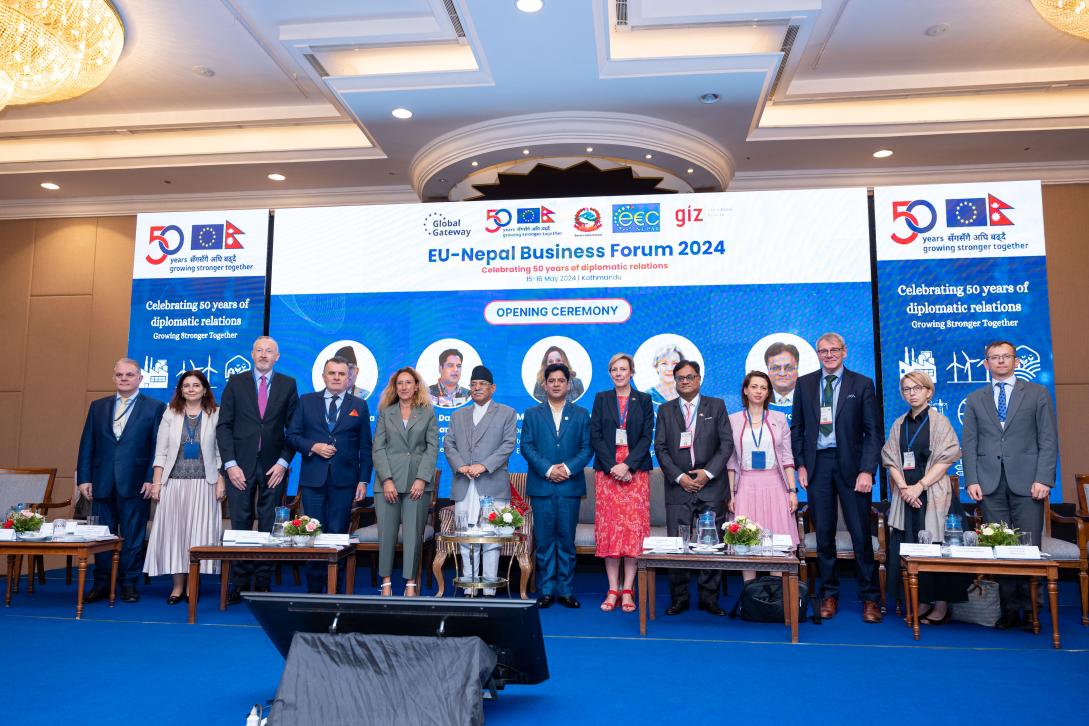 PM Dahal poses for a picture with other guests at the EU-Nepal Business Forum 2024