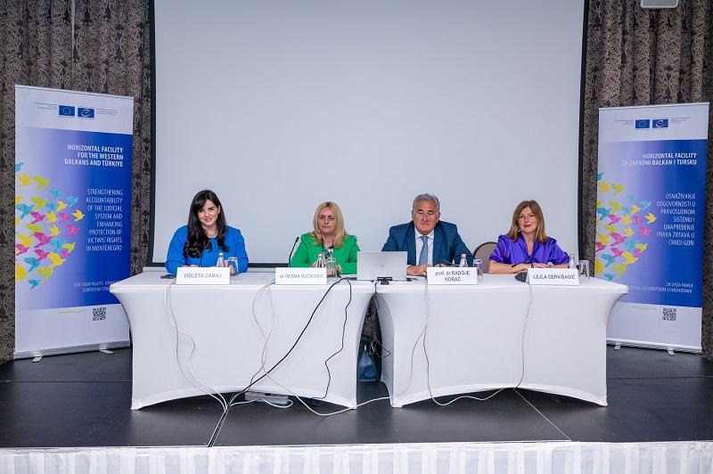 4 Speakers sitting by the two white tables durig the conference on the left and right side of them are two banners with the sentence: Horizontal Facility for the Western Balkans and Turkey