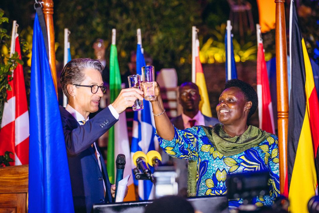 EU Ambassador Jan Sadek and Vice President Jessica Alupo toast