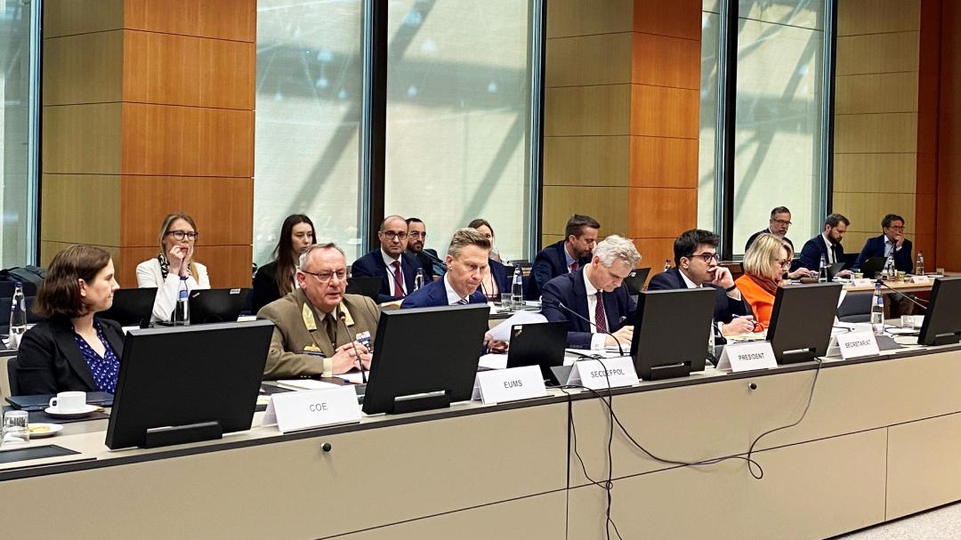 A group of dignitaries at a high-level conference.