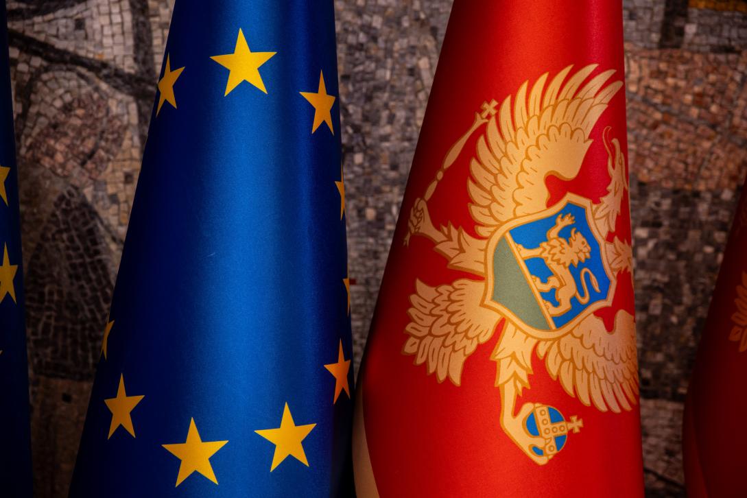 Flag of EU and flag of Montenegro