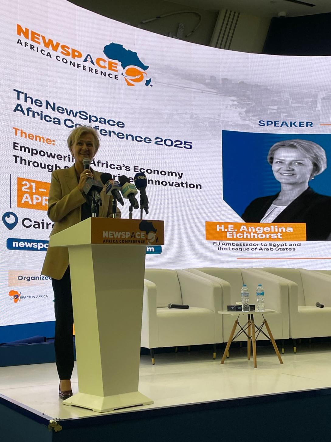 Amb Eichhorst delivering a speech from a podium