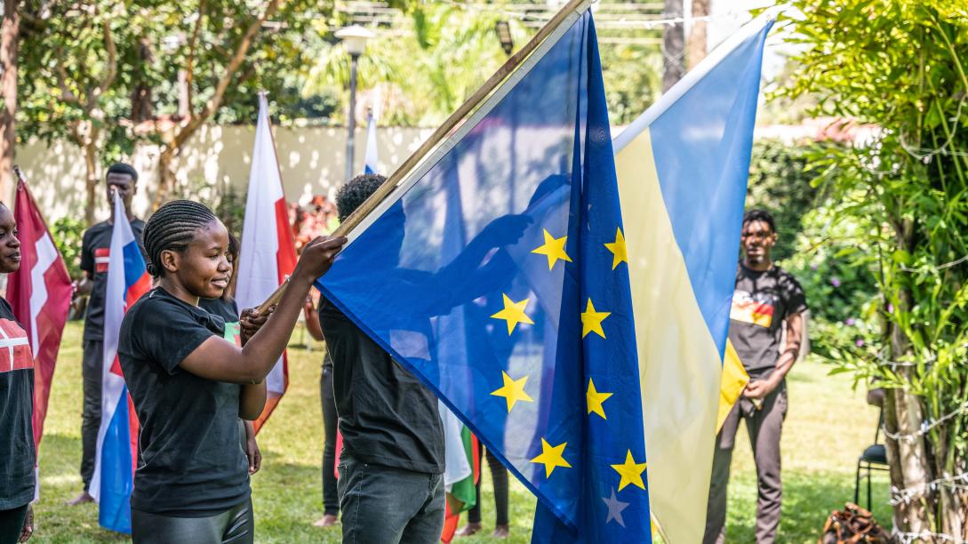 people holding European flags